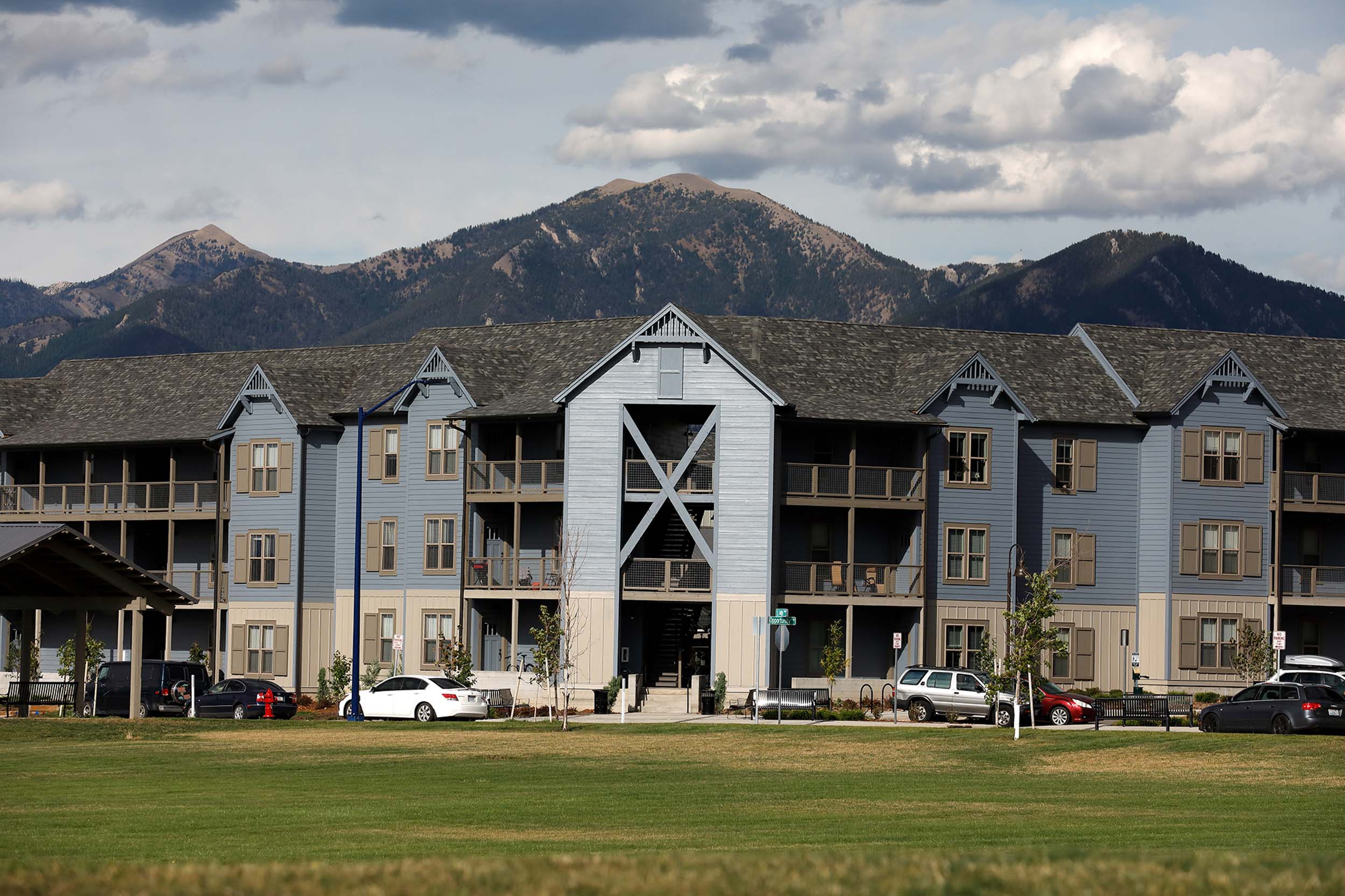 Apartment townhome building against mountains