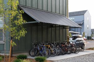Bike storage outside building under eaves