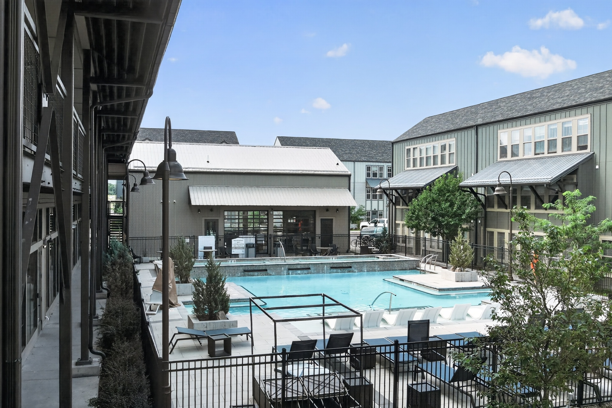 Outdoor swimming pool and hot tub at The Arrow