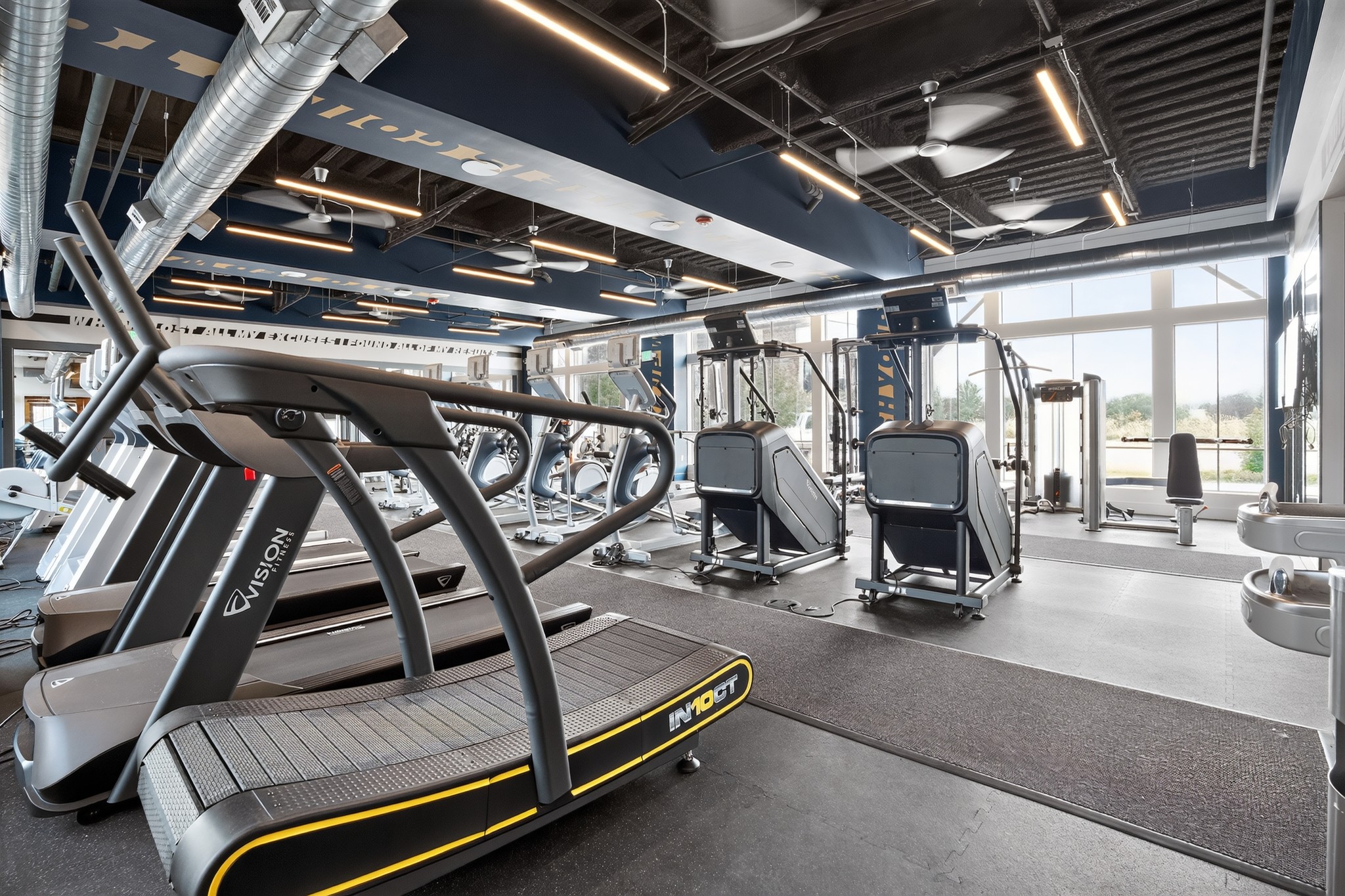 State of the art fitness center with cardio and strength training equipment at The Arrow